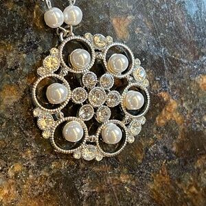 Liz Claiborne costume pearl pendant.
So pretty for that special outfit!